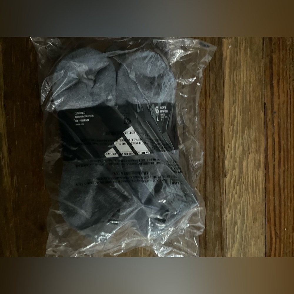 Adidas low cut cushioned athletic socks. New. Gray. Size 8-12.